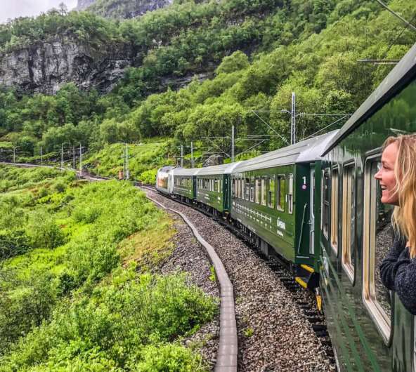 A woman traveling with Flåm railway