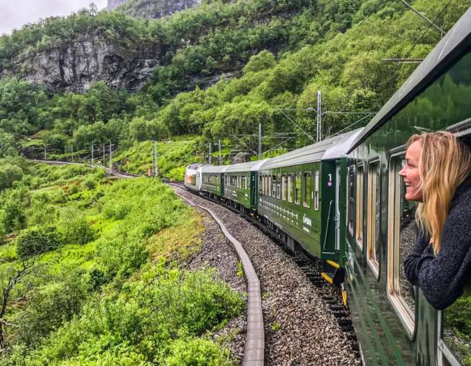 A woman traveling with Flåm railway
