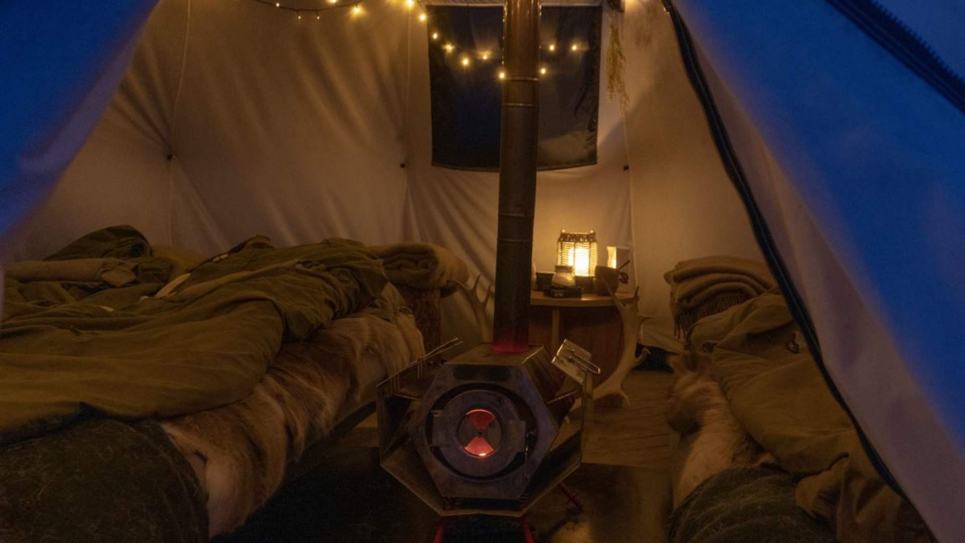 Overnight in Lavvo, Reindeer Feeding and Reindeer Sledding with Chance of Northern Lights