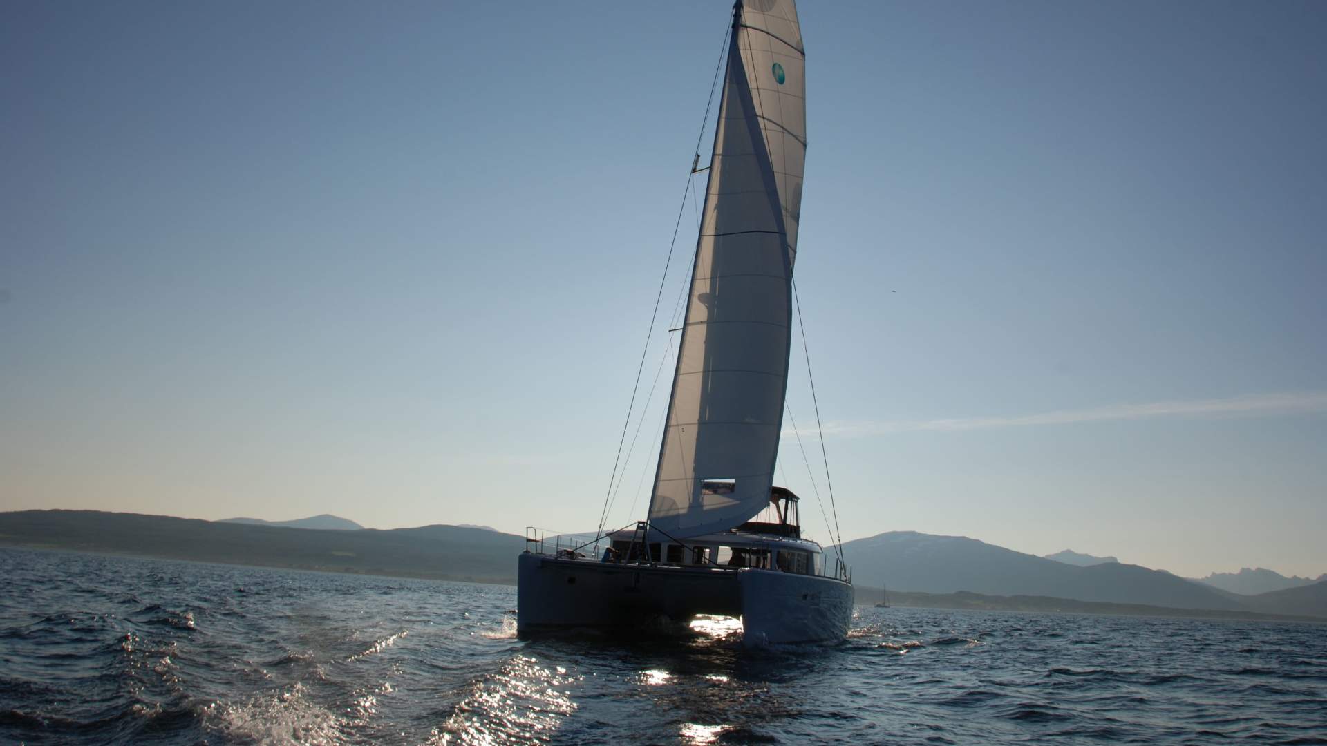 A Beautiful Arctic Midnight sun sailing with the newest Luxury catamaran Arctic Princess