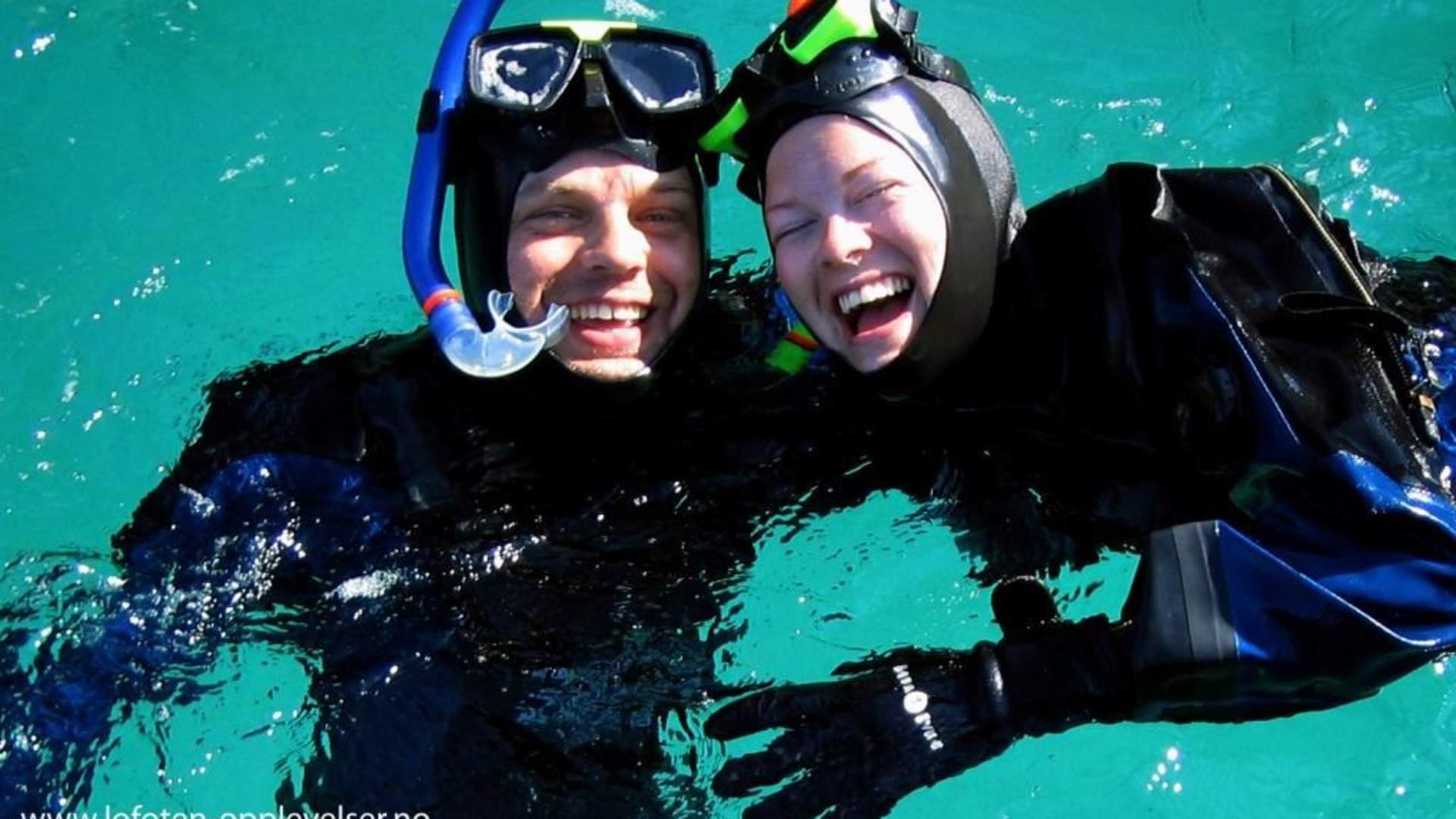 Experiencing snorkelling in crystal clear arctic waters