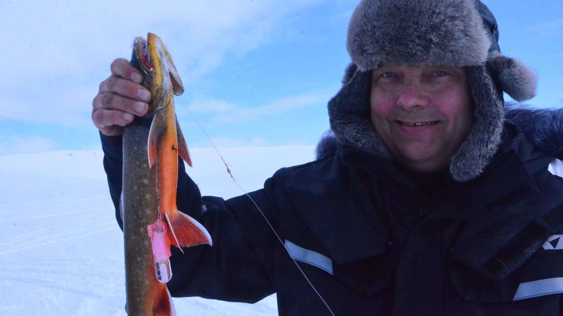 Ice Fishing on the plateau of Finnmark