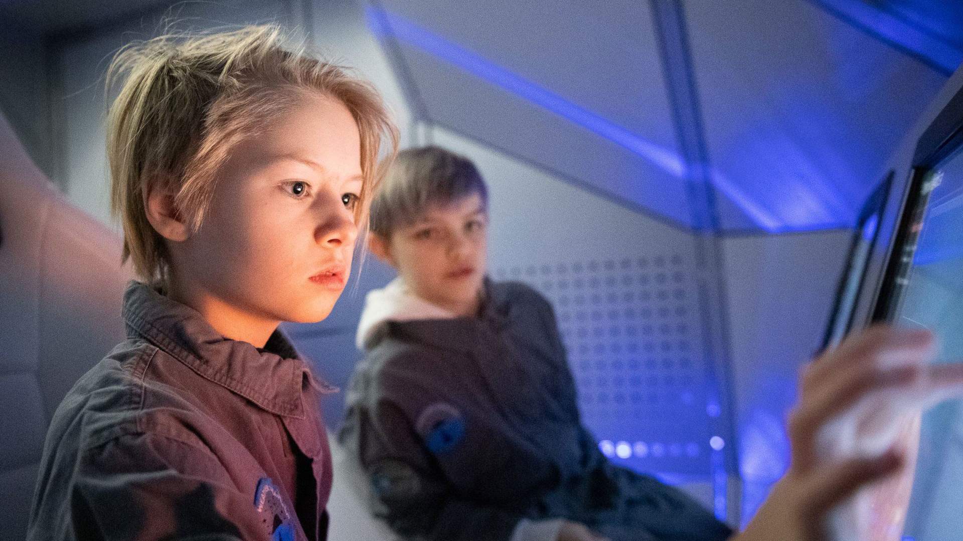 Kids playing and exploring the spaceship