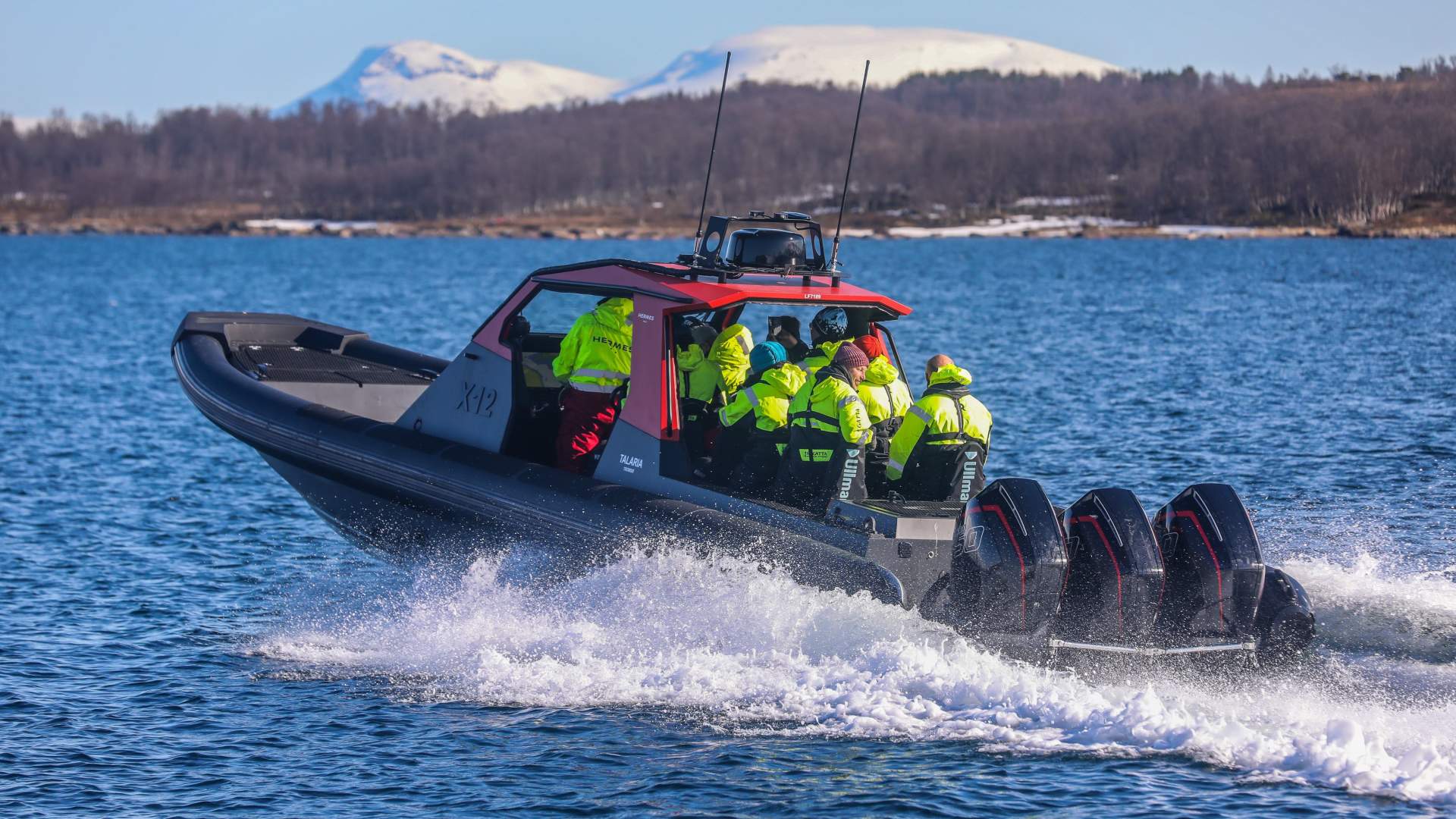 A RIB boat speeding on the water