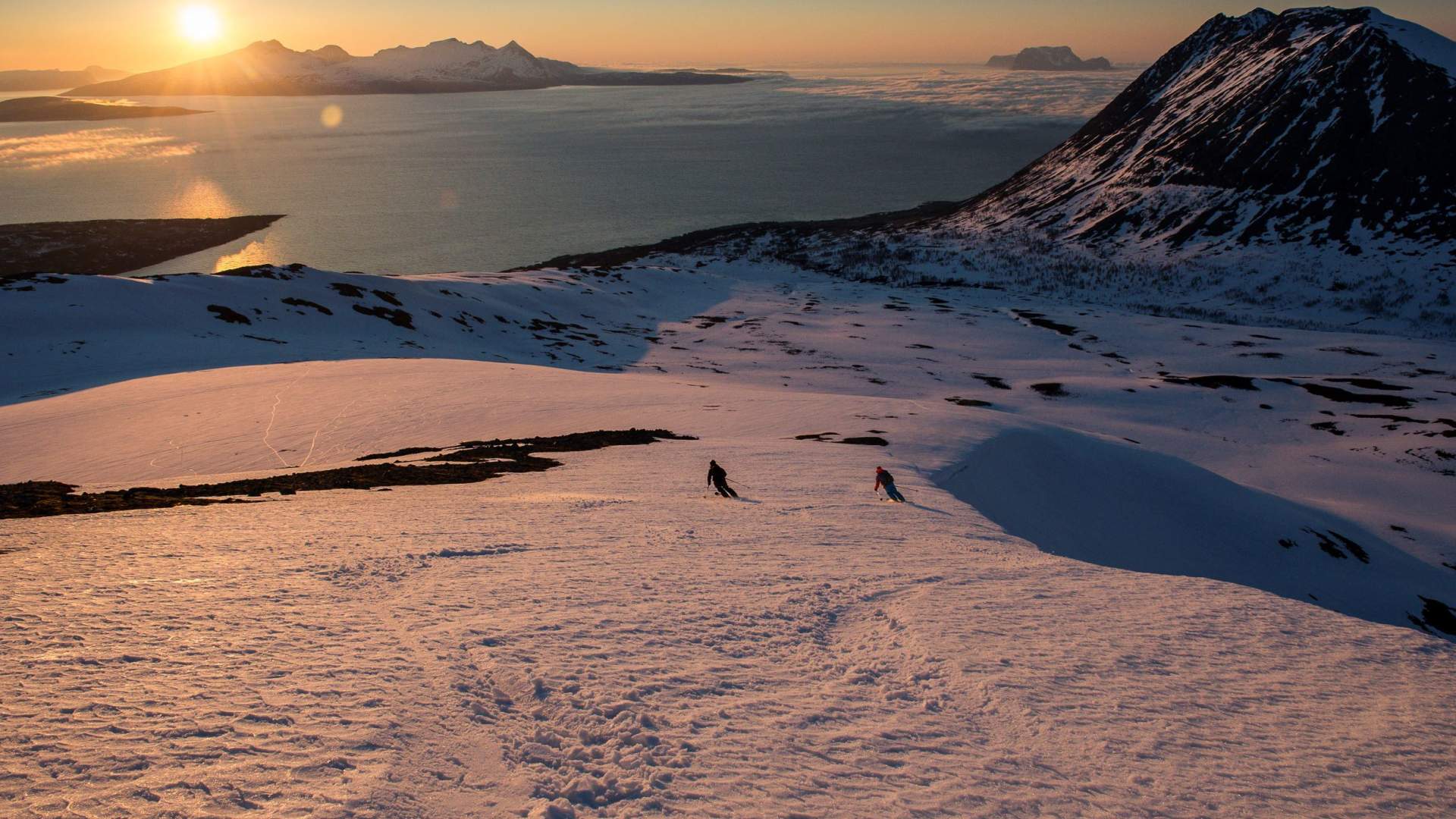 Ski touring Lyngen Alps under the midnight sun
