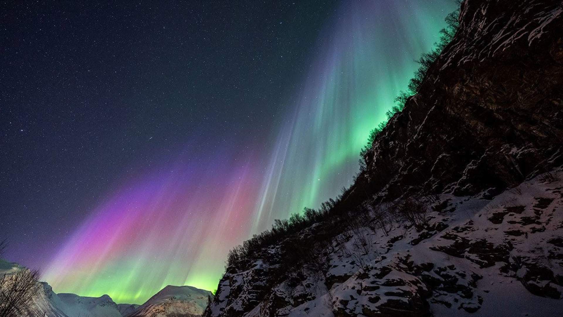 Northern lights chase by minibus