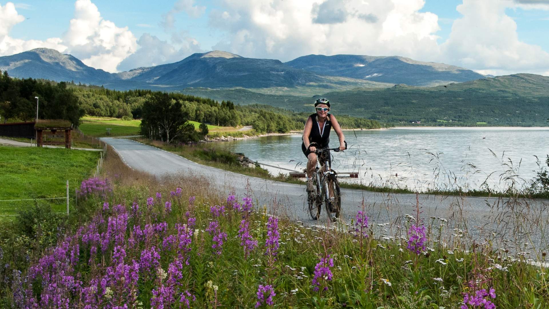 Biking along Stuggusjøen Lake