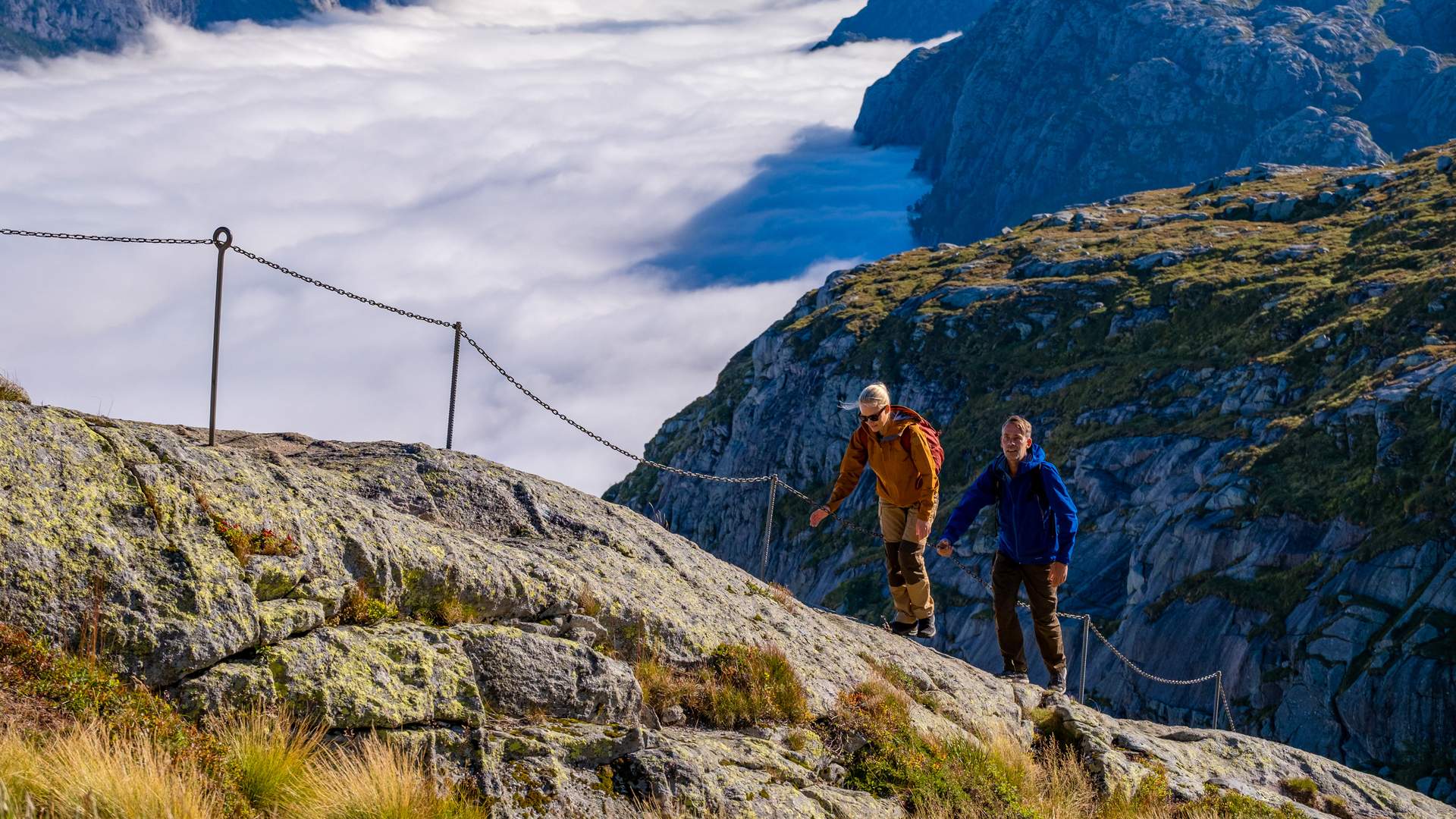 Hiking route to Kjerag - chain ropes attached to the mountain_