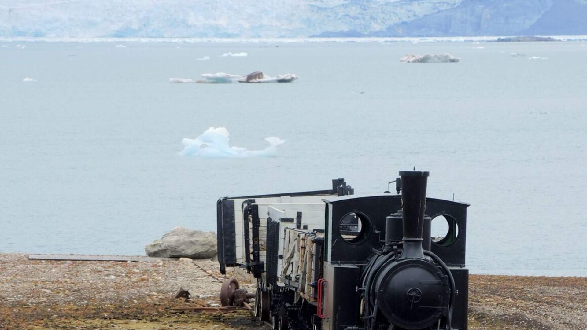 Ny-Alesund train and glacier by Franka Leiterer