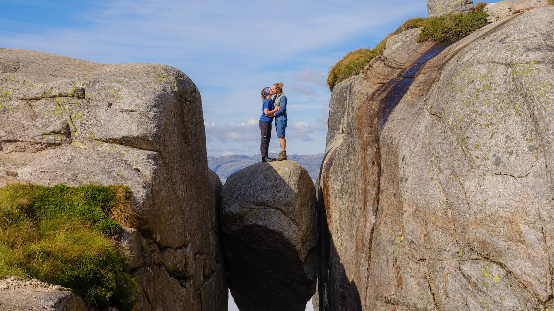 Romantic couple on the Kjeragbolten_