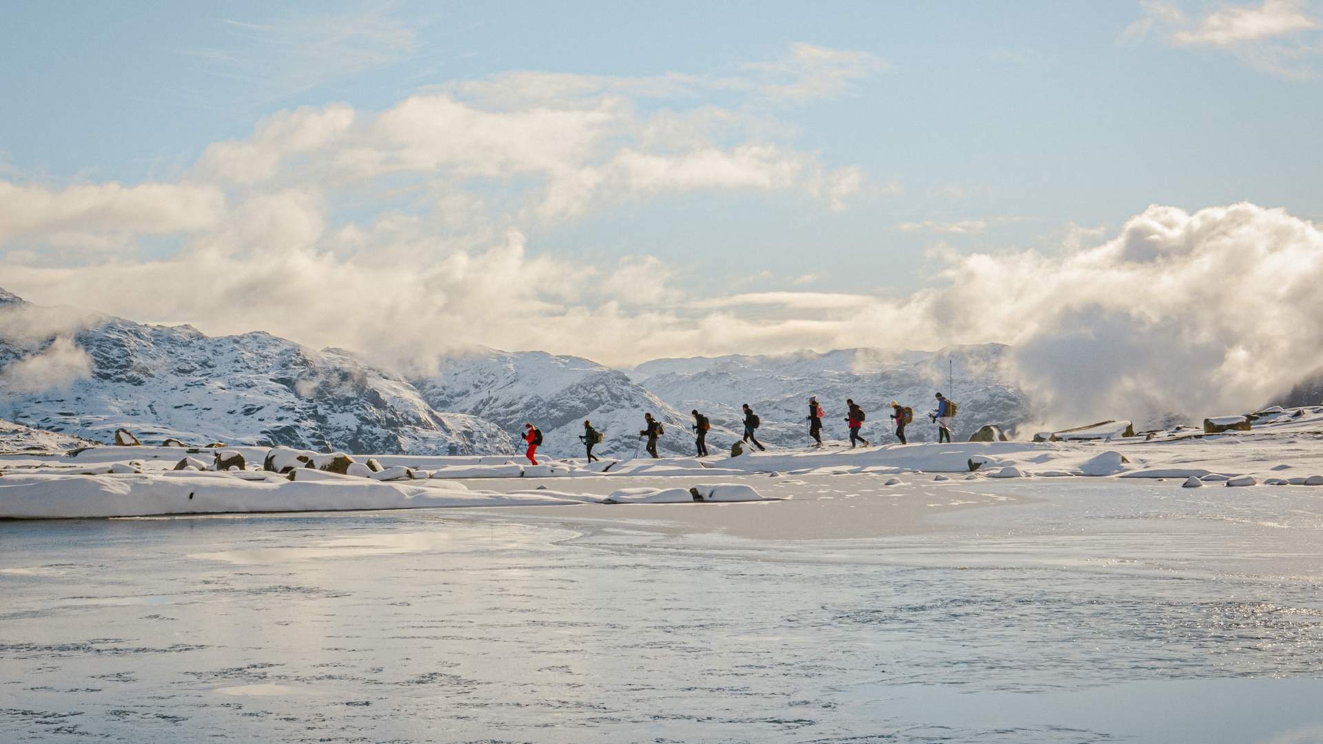 Trolltunga Active_Guided Winter Expedition_Trail_snowshoes_reflection