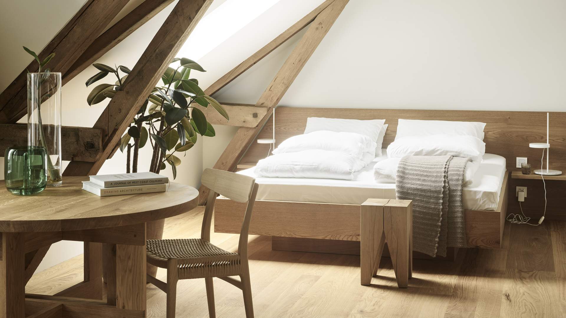 Soveplassen på rommet hos Hotel 1904