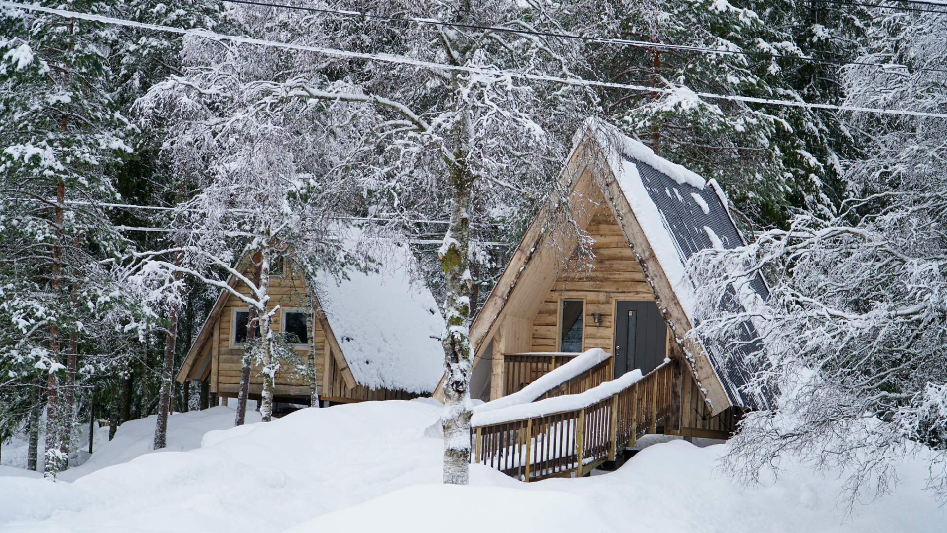 Sirdal Huskyfarm and their tee-pee cabins covered in snow