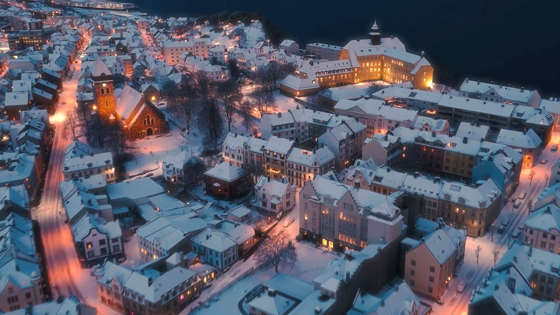 Enchanting snowy evening in Ålesund.