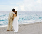 Bride and Groom Kissing on the Beach 
