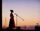 Jonel Langenfeld, SUNY Oswego Professor of Theatre and theatre professional will perform at the upcoming Tales of the Haunted Harbor presented by the H. Lee Marine Museum & Maritime Center. Community performers, (Elsa Batista shown in last year’s show) will thrill audiences with their talent. The storytelling event takes place, Friday, August 23, at 7 pm on the West Pier in Oswego. For more information contact the museum at 342.0480. Photo by Mary Ellen Barbeau of Oswego County Promotion and Tourism.