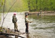Instructor Lindsay Agness, left, will lead the fifth annual Women’s Fly Fishing Seminar sponsored by the Tug Hill Chapter of Trout Unlimited and the NYS DEC June 2 and 3 in Altmar. Agness is pictured with participants at last year’s seminar. (Photo by Jessica Burt, Oswego County Tourism Office.)