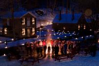 Visitors enjoy the magic of last year’s Candlelight Evening in the Historic Village of The Farmers’ Museum.