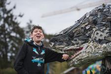 Boy and Shark Sculpture at Washed Ashore