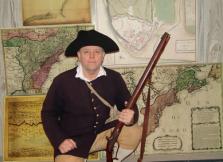 Randy Patten with some of his dozens of historic military maps.