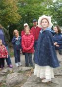Celinda Eliza Whitney greets guests on the Island named for her