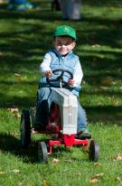 A young tractor enthusiast takes part in the “Kiddie Pedal-Tractor Pull” at last year’s Tractor Fest at The Farmers’ Museum in Cooperstown, NY.