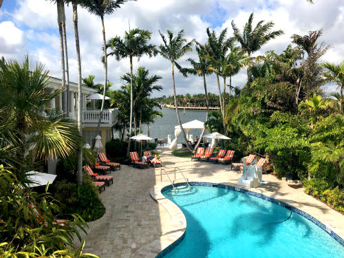 Pool and courtyard view of The Pillars in Fort Lauderdale