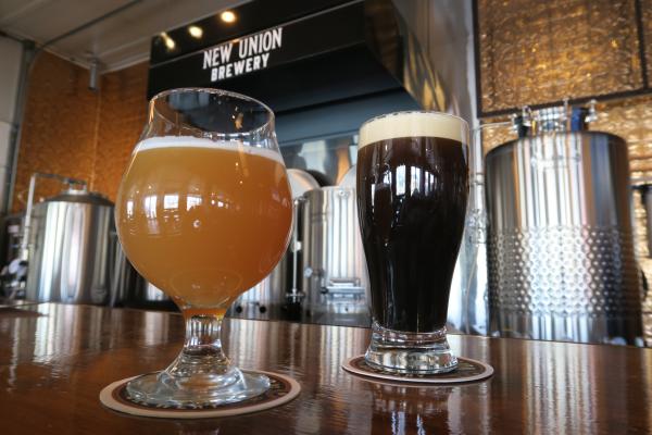 Glasses of Flat River Imperial IPA and Main Street Chocolate Stout and New Union Brewery