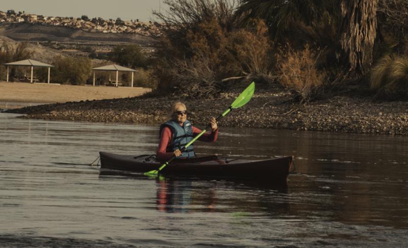 A woman kayaks along the Colorado River in Laughlin, Nevada