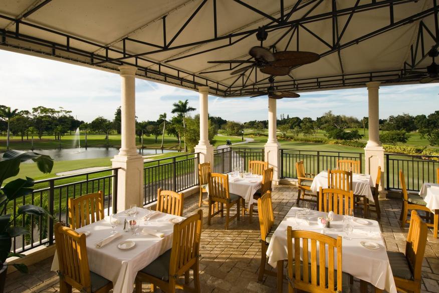 outdoor dining overlooking golf course