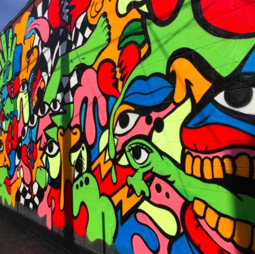 Street art mural by Detroit artist Sheefy McFly