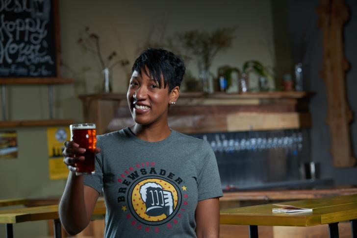 Woman wearing Brewsader t-shirt