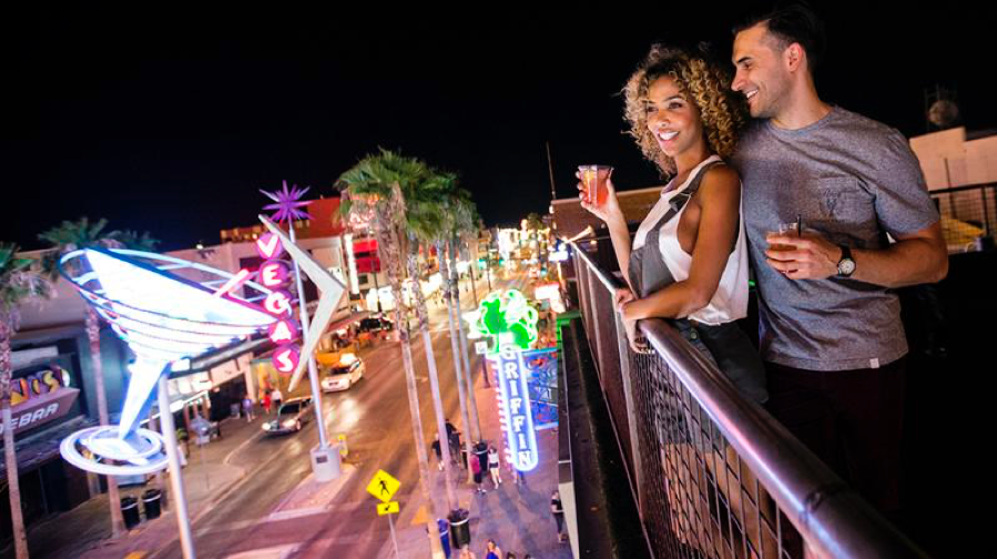 Couple on Fremont street at night