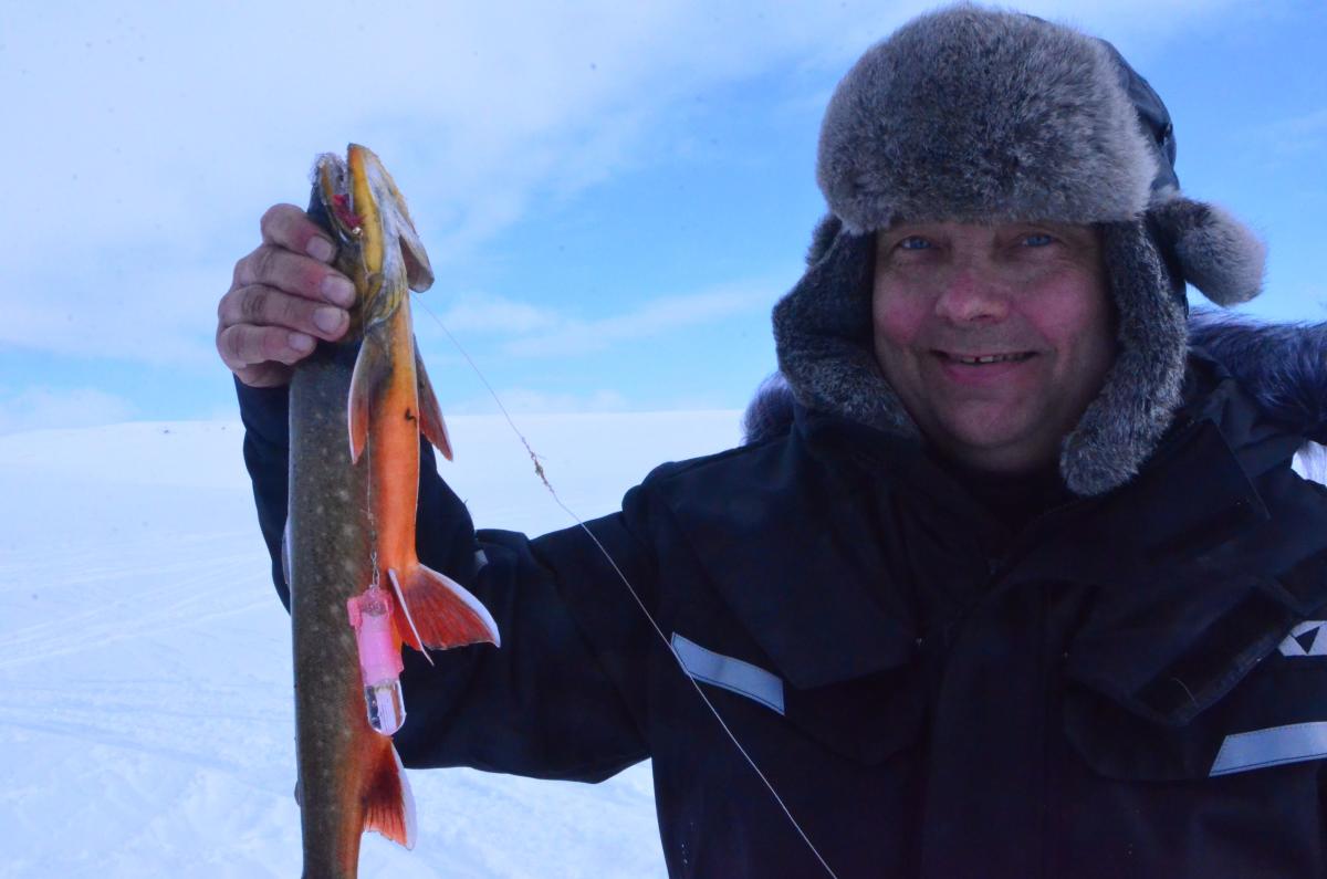 Ice Fishing on the plateau of Finnmark