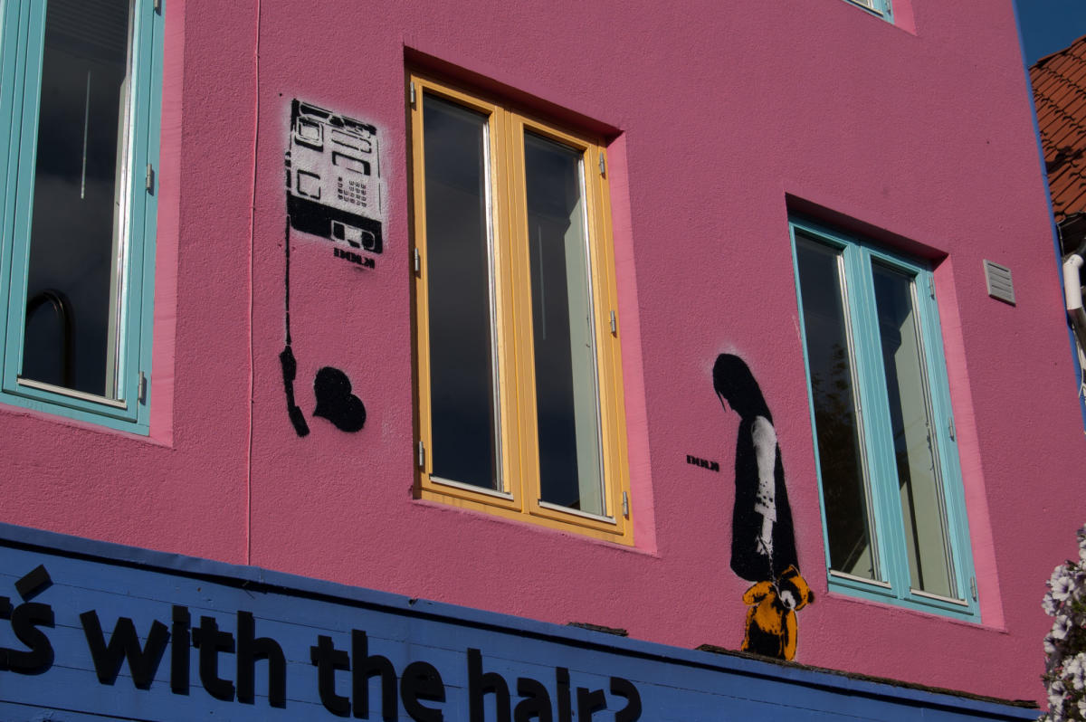 Stavanger Street Art: "Girl with Teddy + Heart Phone" by Dolk