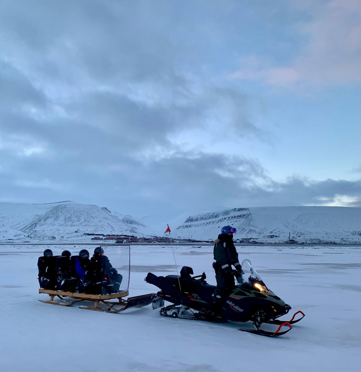 Sleigh ride by snowmobile Spitzbergen Adventures Snowscooter