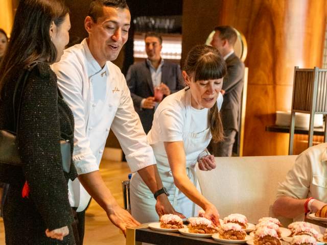 Grand Revelry Brunch: Kate Reid and Wynn Asst. Exec. Baker Diego Cubas bring out Raspberry Coconut Finger Buns
