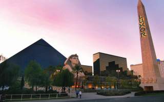 An exterior view of Egyptian inspired buildings outside of the Luxor.