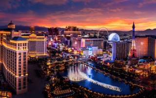 Aerial view of the Las Vegas Strip at night with the Fountains of Bellagio.