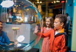 A child is wowed at the Discovery Children’s Museum in Las Vegas.