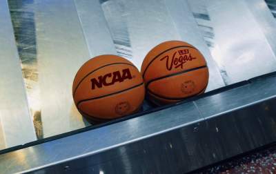 Two basketballs that say "NCAA" and "Las Vegas"