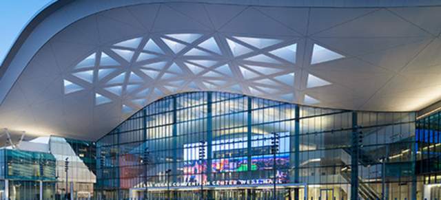Photo of the entrance to the Las Vegas Convention Center at dusk.