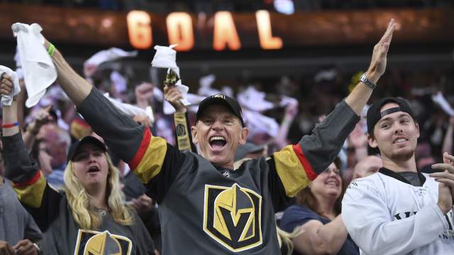 A Las Vegas Golden Knight fan rooting for his team.
