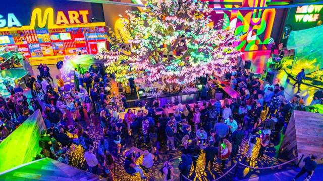 People hanging out at a bar within Area 15