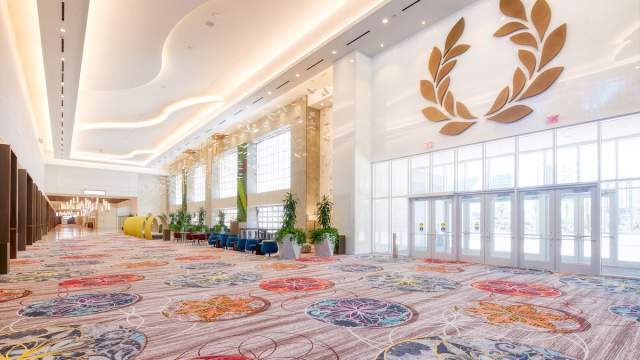 A place to gather and discuss with colleagues at the Prefunction at Caesars Forum in Las Vegas.