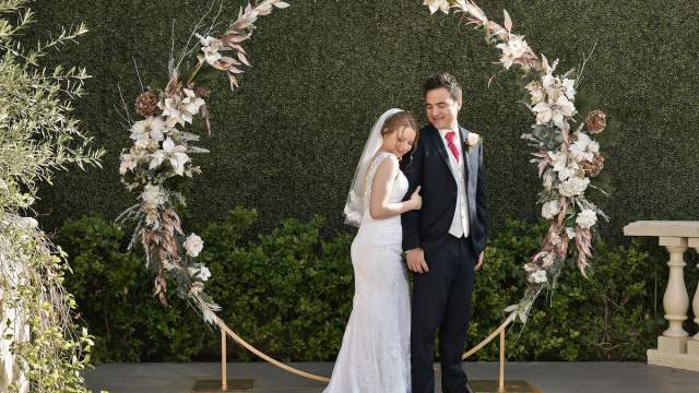 A couple getting married at the chapel of flowers.