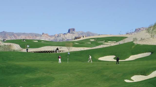 A group of people enjoying golf at Laughlin Ranch Golf Club.