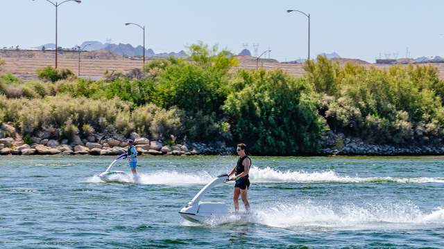 People jetskiing on the Colorado River in Laughlin.