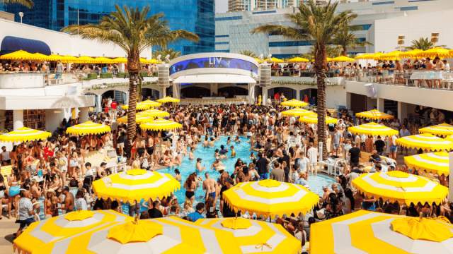 Stage, umbrellas, and crowd at LIV Beach Club