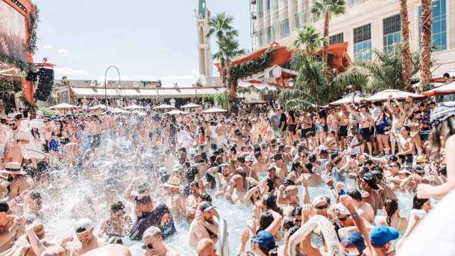 A large crowd partying in the pool at the Asian inspired Tao Beach Club.